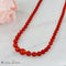 Collier Collier en corail avec fermoir en or jaune 18 carats 58 Facettes 2523