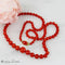 Collier Collier en corail avec fermoir en or jaune 18 carats 58 Facettes 2523