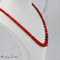 Collier Collier en corail avec fermoir en or jaune 18 carats 58 Facettes 2523