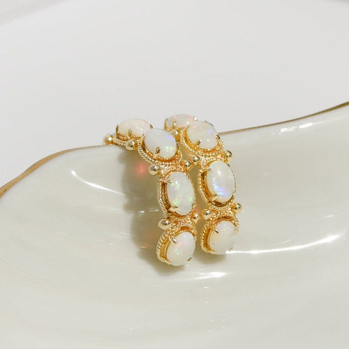 Boucles d'oreilles Boucles d’oreilles vintage en or jaune 14 carats et opales 58 Facettes 2870