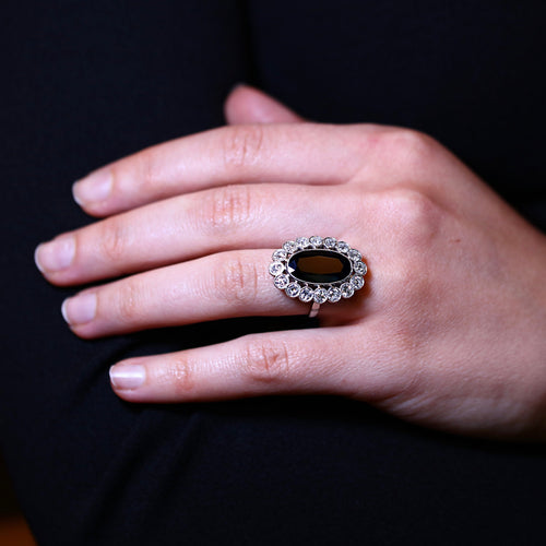 Bague 51 Bague marguerite sertie d’un saphir ovale en platine et diamants 58 Facettes