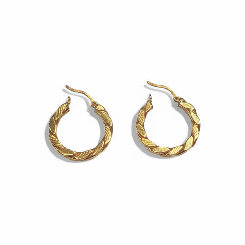 Boucles d'oreilles Créoles torsadées en or jaune 18K 58 Facettes
