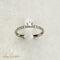 Bague 52.5 Bague halo en platine 950 avec solitaire et 16 diamants 58 Facettes 2821