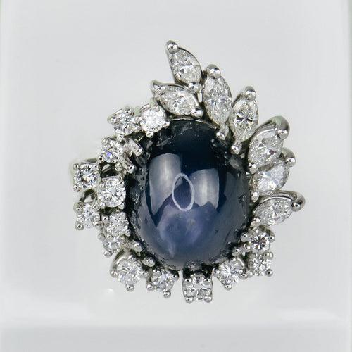 Bague 53.5 Bague en or blanc 750 avec saphir étoilé et diamants 58 Facettes 1864