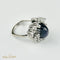 Bague 53.5 Bague en or blanc 750 avec saphir étoilé 15 ct et diamants 58 Facettes 1864