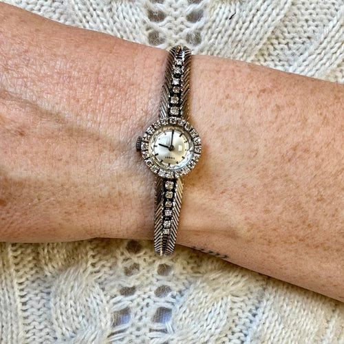 Montre Tissot - Montre de cocktail femme en or gris 18K sertie de diamants 58 Facettes REF24018-182