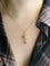 Pendentif Pendentif charm montgolfière en or jaune 18k et pierre rouge 58 Facettes 1CA0000005/3