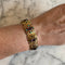 Bracelet Bracelet ancien en or jaune 18K améthystes et turquoises 58 Facettes REF2224-24
