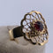 Bague 58 Bague marguerite en or jaune 18 carats avec grenat 58 Facettes 250176