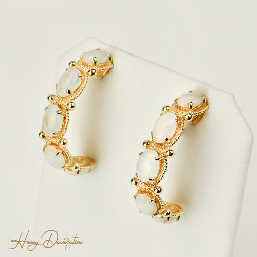 Boucles d'oreilles Boucles d’oreilles vintage en or jaune 14 carats et opales 58 Facettes 2870