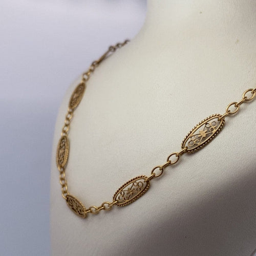 Collier Collier filigrane ajouré en or jaune 18K 12,59 g 58 Facettes 250194