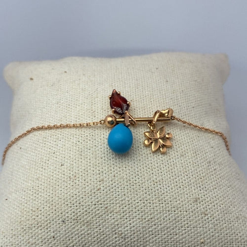 Bracelet Guérin Joaillerie - Bracelet à charms en or jaune 18K 58 Facettes 250190
