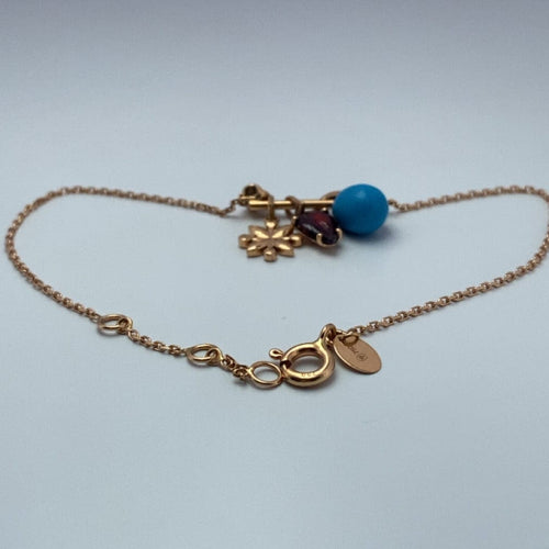 Bracelet Guérin Joaillerie - Bracelet à charms en or jaune 18K 58 Facettes 250190