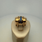 Bague 55 Bague sertie en or jaune 18 carats avec pierres bleues 58 Facettes 250038
