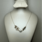 Collier Collier floral avec perle en or jaune 18 carats 58 Facettes 250017