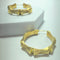 Boucles d'oreilles Boucles d’oreilles créoles bambou en or jaune 18 carats 58 Facettes 250094