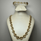 Ensemble collier et bracelet maille grain de café en or jaune 18K 58 Facettes 250061-62