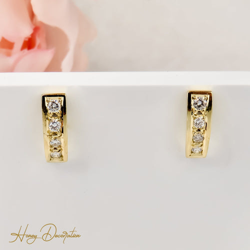 Boucles d'oreilles Boucles d’oreilles en or jaune 585 avec diamants taille brillant 0,24 ct 58 Facettes 2337