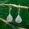 Boucles d'oreilles Boucles d’oreilles pendantes Art déco en or blanc 18k, cristal de roche et diamants 58 Facettes