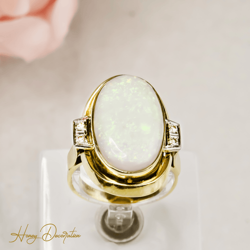 Bague 63 Bague cocktail opale cabochon et diamants en or 14 carats 58 Facettes 2619