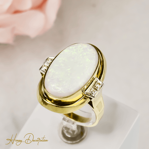 Bague 63 Bague cocktail opale cabochon et diamants en or 14 carats 58 Facettes 2619
