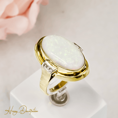 Bague 63 Bague cocktail opale cabochon et diamants en or 14 carats 58 Facettes 2619