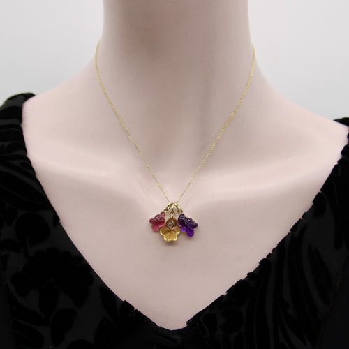 Pendentif Pendentif fleur en or jaune 14 carats et citrine sculptée 58 Facettes A2006W