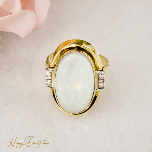 Bague 63 Bague cocktail opale cabochon et diamants en or 14 carats 58 Facettes 2619