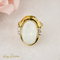 Bague 63 Bague cocktail opale cabochon et diamants en or 14 carats 58 Facettes 2619