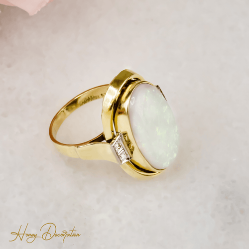 Bague 63 Bague cocktail opale cabochon et diamants en or 14 carats 58 Facettes 2619