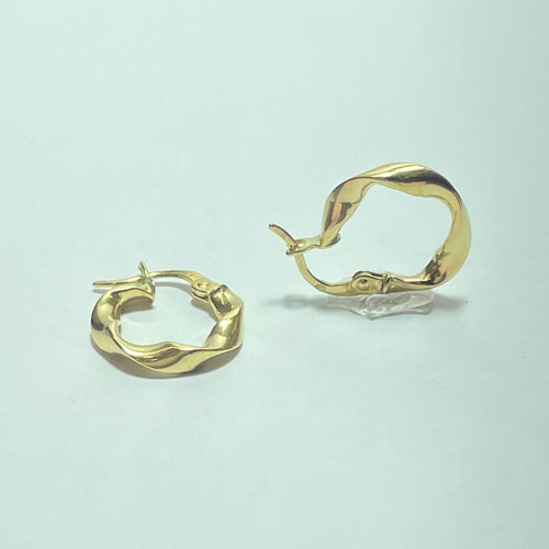 Boucles d'oreilles Boucles d’oreilles créoles torsadées en or jaune 18K 1,24 g 58 Facettes 250348