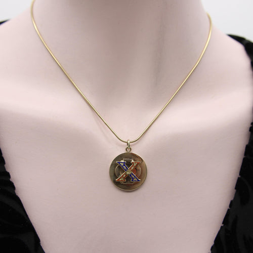 Pendentif Cartier - Pendentif médaillon vintage en or jaune 14K émaillé 58 Facettes A1003B