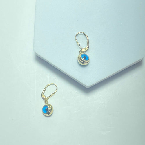 Boucles d'oreilles Boucles d’oreilles pendantes motif œil bleu en or jaune 14 ct 58 Facettes 250366