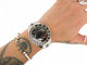 Montre Christian Dior Cristal - Montre chronographe en acier palladié sertie de diamants 58 Facettes 270228