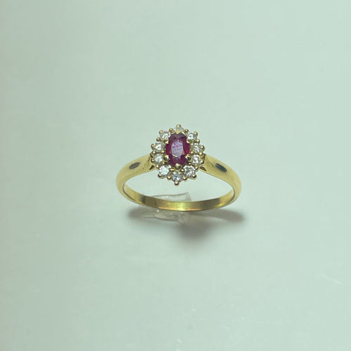 Bague 60 Bague marguerite rubis et diamants en or jaune 18 carats 58 Facettes 250390