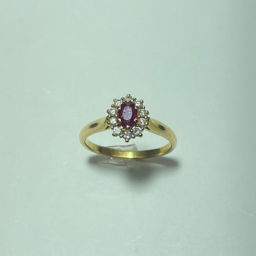 Bague 60 Bague marguerite rubis et diamants en or jaune 18 carats 58 Facettes 250390