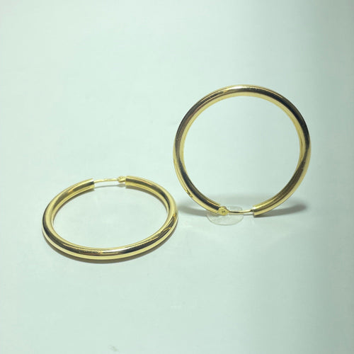 Boucles d'oreilles Boucles d'oreilles créoles rondes en or jaune 18 carats 3,08 g 58 Facettes 260010