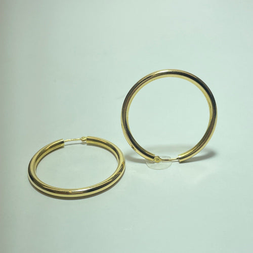 Boucles d'oreilles Boucles d'oreilles créoles rondes en or jaune 18 carats 3,08 g 58 Facettes 260010
