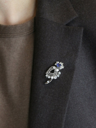 Broche Mauboussin - Broche fleur en or blanc 18k saphir et diamants 58 Facettes 342