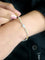Bracelet Bracelet ligne en or blanc 18 carats avec citrines, péridots et topazes bleues 58 Facettes 1CA0000006/1