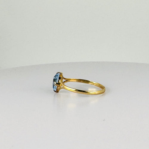 Bague Bague vintage en or jaune 14 carats avec topaze bleue 58 Facettes 2508021
