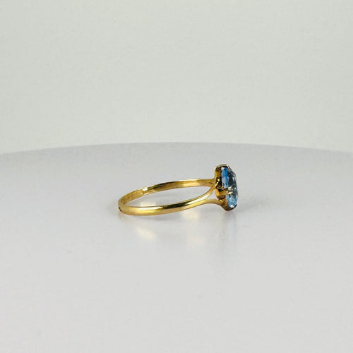 Bague Bague vintage en or jaune 14 carats avec topaze bleue 58 Facettes 2508021