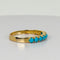 Bague Bague vintage en or jaune 14k avec turquoises 58 Facettes 2507016