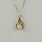 Pendentif Pendentif vintage en or jaune 18 carats et perle ronde 58 Facettes 2508018
