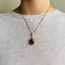 Pendentif Pendentif vintage en or jaune 18 carats et améthyste ovale 58 Facettes 2509002