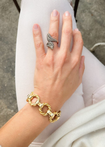 Bracelet Chaumet - Bracelet à anneaux torsadés en or jaune 18k 58 Facettes 1