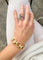 Bracelet Chaumet - Bracelet à anneaux torsadés en or jaune 18k 58 Facettes 1