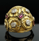 Bague Cozzolino - Bague bombée en or jaune 18K avec diamants et rubis 58 Facettes