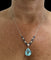 Collier Collier pendentif vintage en or blanc 18 carats avec aigue-marine, diamants et saphirs 58 Facettes