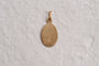 Pendentif Médaille religieuse ovale angelot en or jaune 18 carats 58 Facettes Ref2683